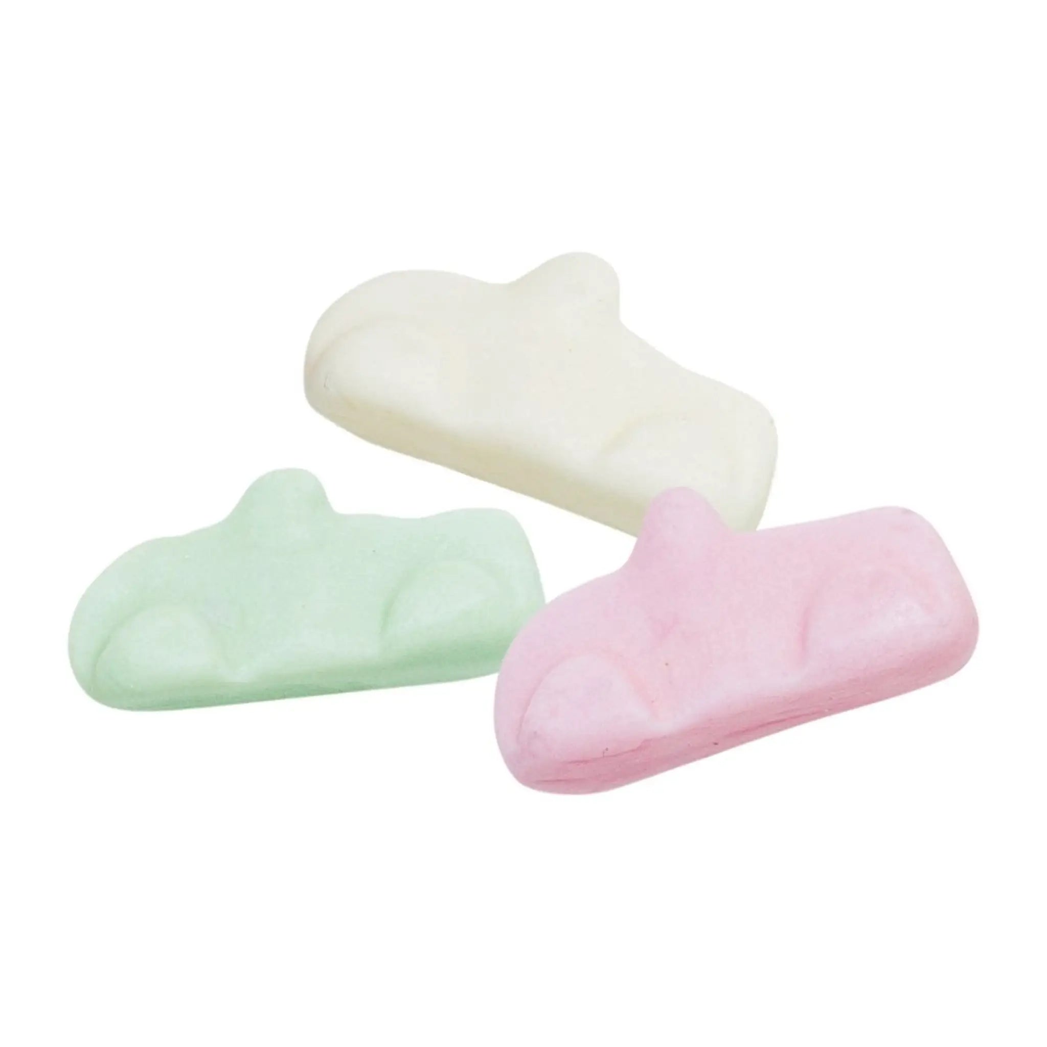 Swedish candy in the shape of cars in green, white and pink.