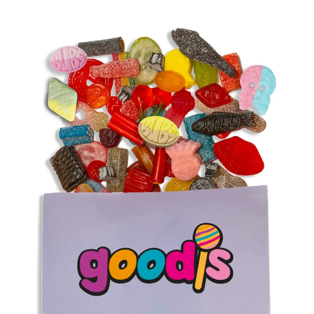 Purple bag with Swedish candy in different shapes and colors falling out of it, including Bubs.