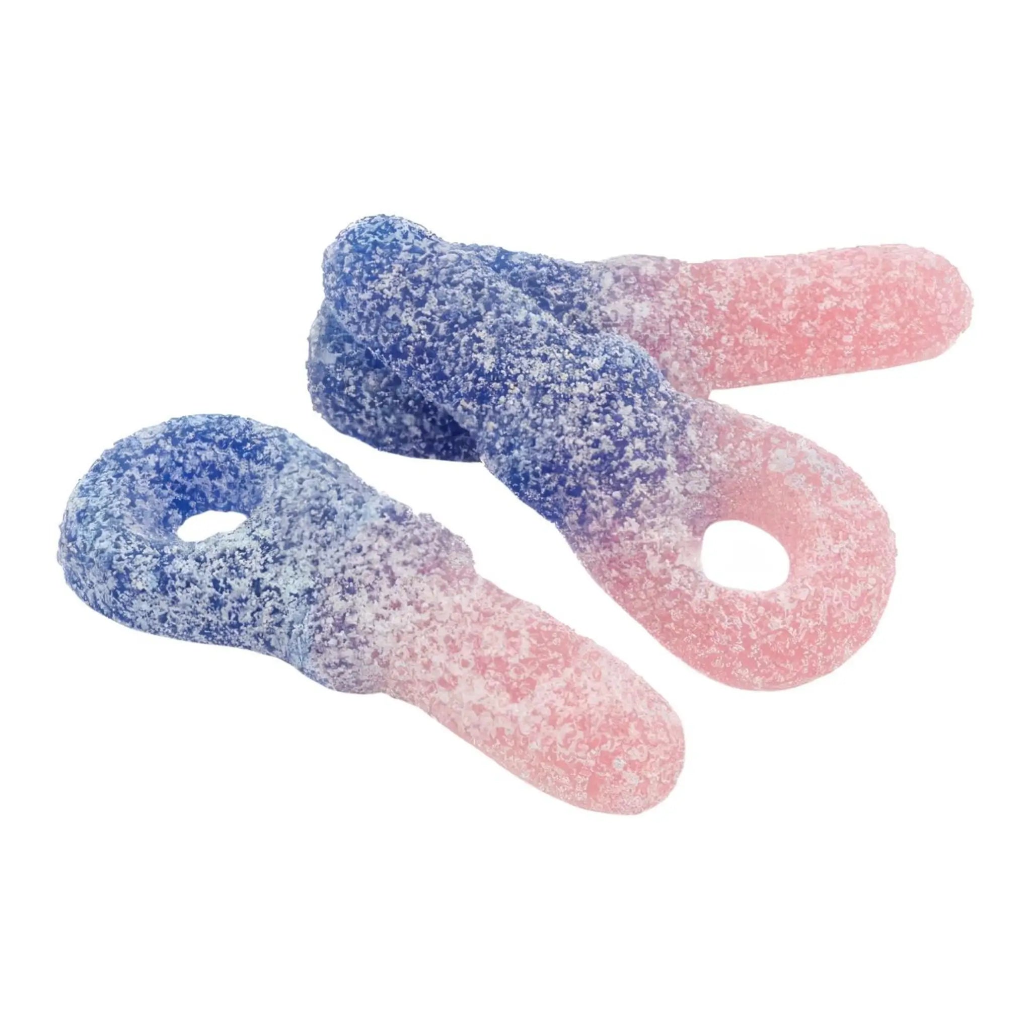 Three pieces of Swedish candy in blue and pink, in the shape of pacifiers and coated in sugar.