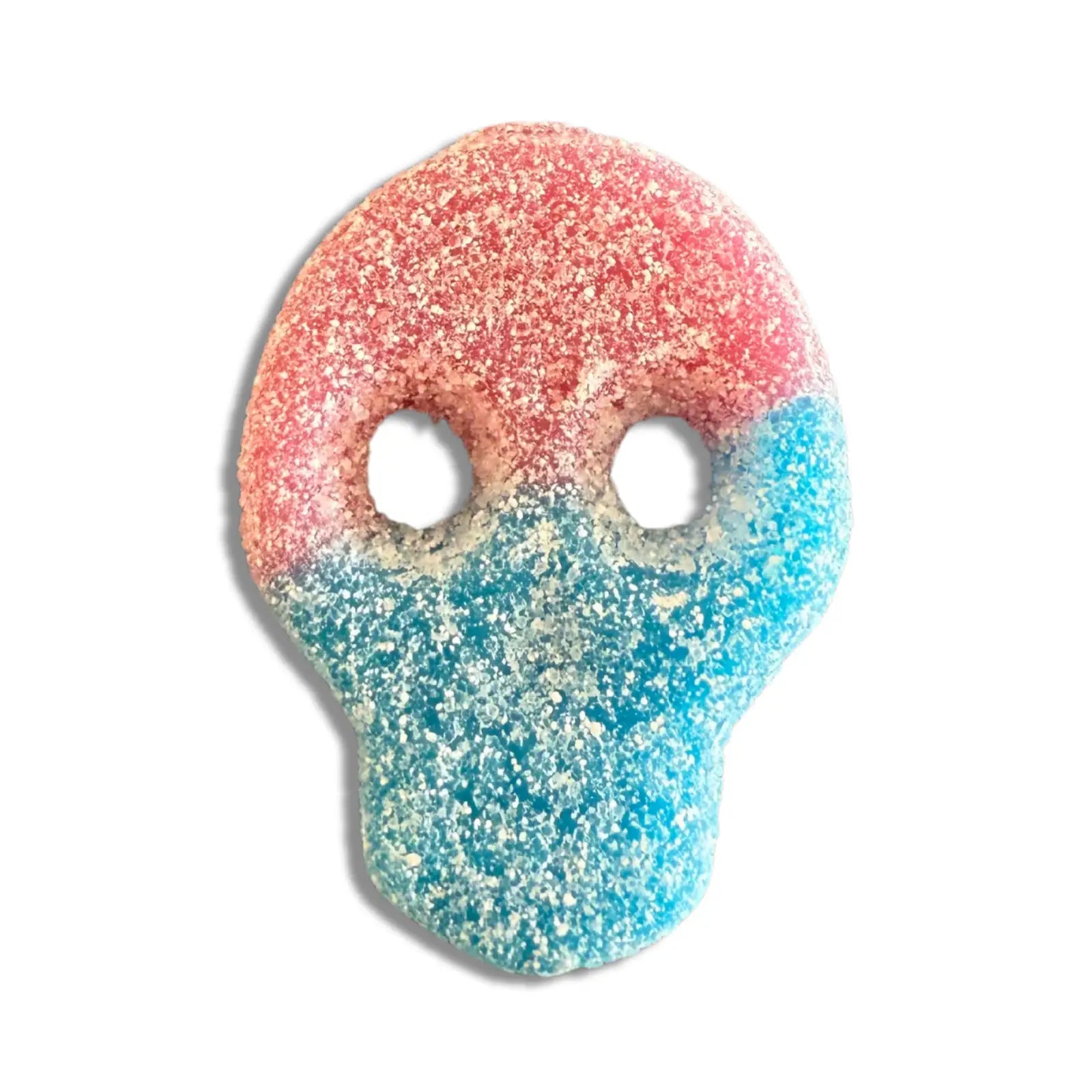Swedish candy in the shape of skulls, orange and blue, coated in sugar.
