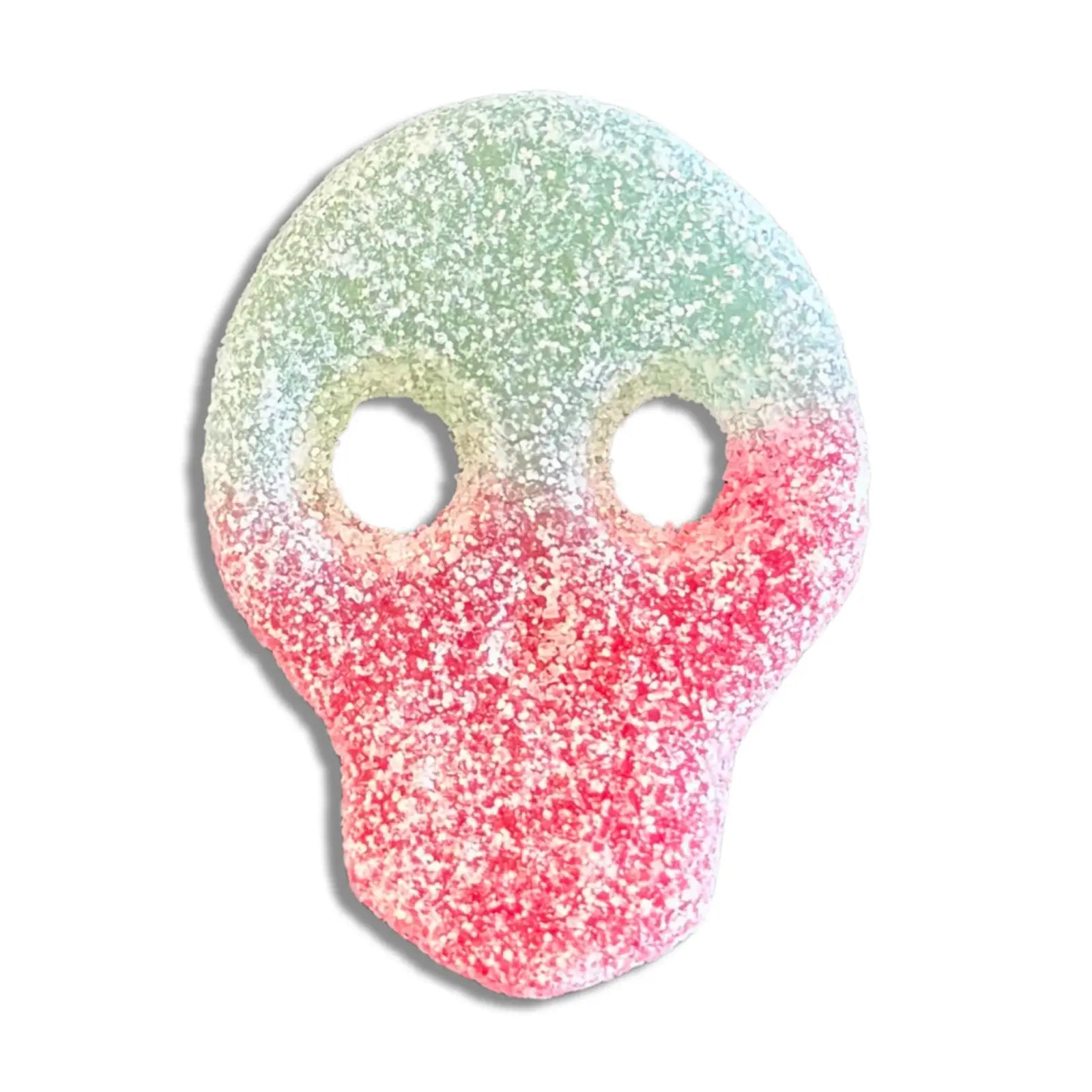 Swedish candy in the shape of a skull, green and red, coated in sugar.